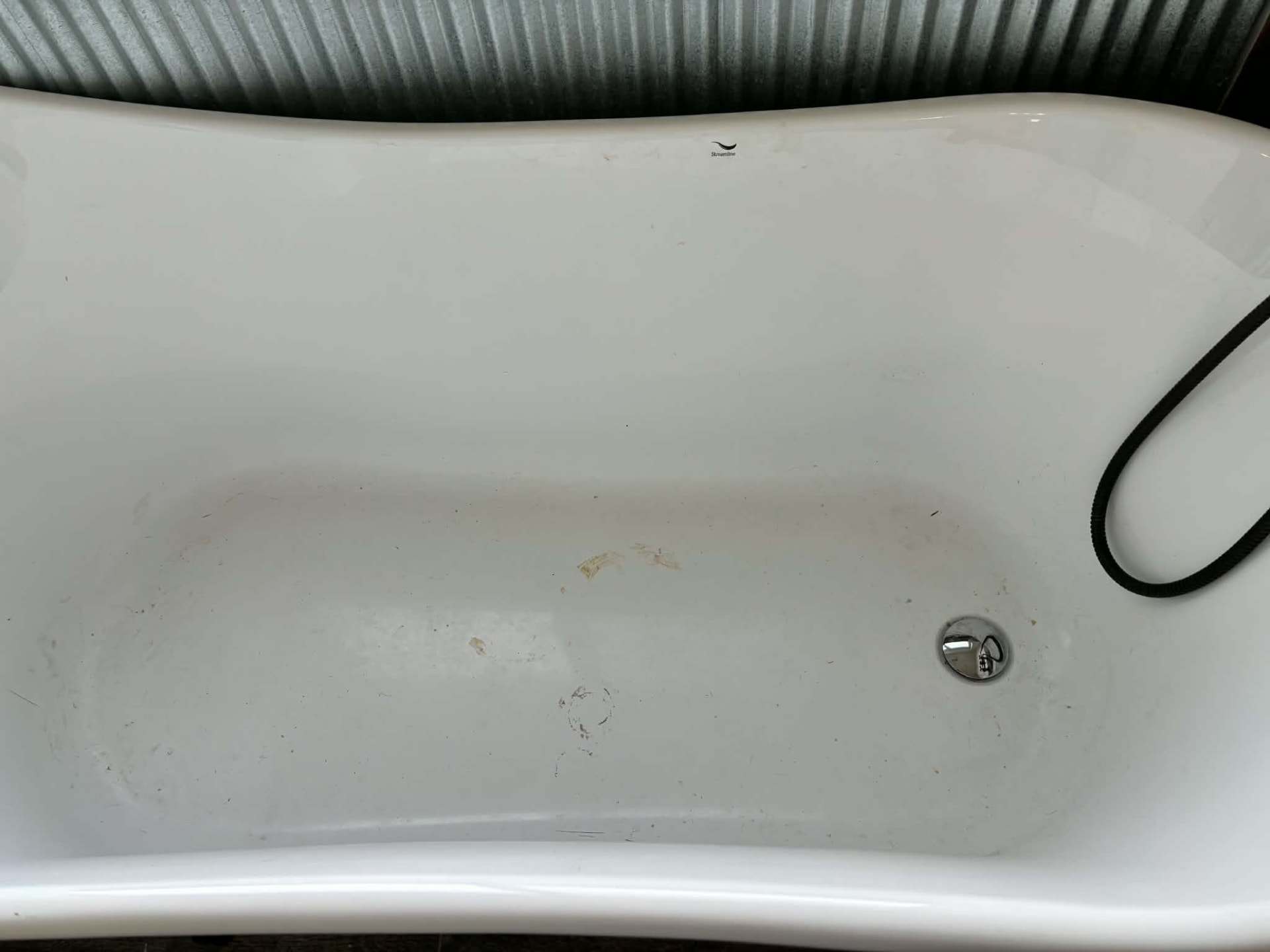 Bathtub — scrubbed & shining before cleaning